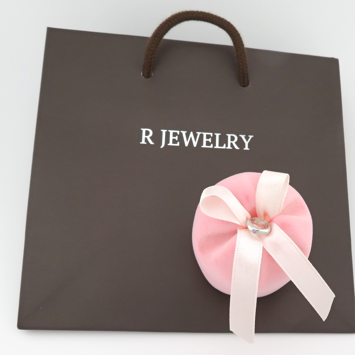 ご出産・ご誕生のお祝いにベビーリング_12月の誕生石タンザナイトリング写真１